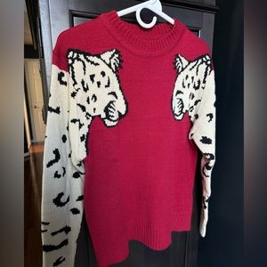 Women’s L red, Cheetah sleeve sweater